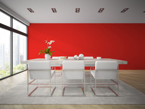 Modern commercial conference room with a freshly painted accent wall completed by AR Interiors Decoration Inc